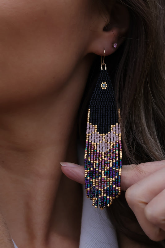 long, dangly black and purple beaded earrings