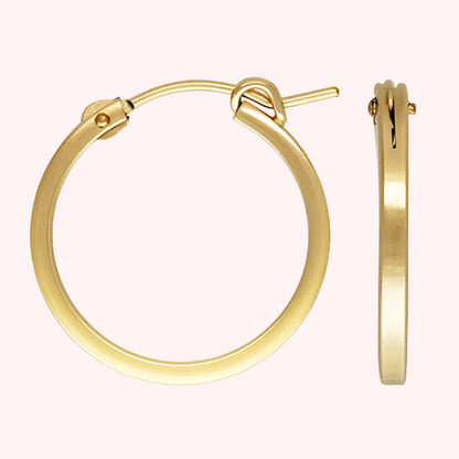 A pair of 20 mm gold-colored hoop earrings with a latch closure, displayed against a white background.