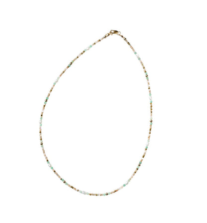 Necklace with small beads on a white background