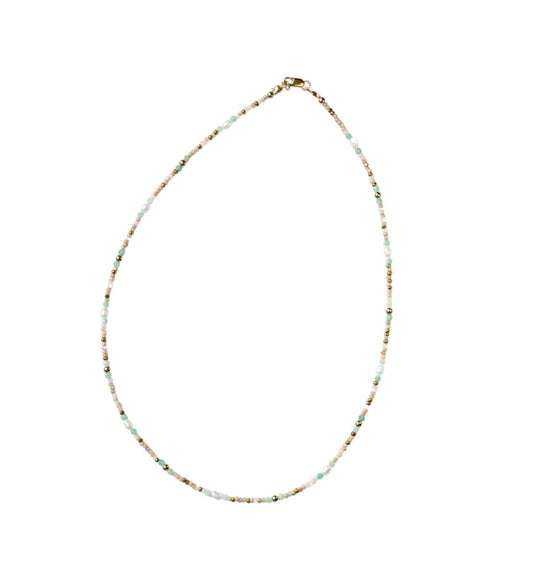 Necklace with small beads on a white background