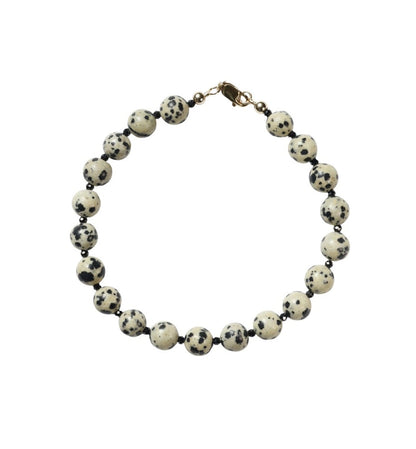 Necklace with round beads on a white background