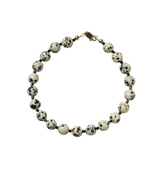 Necklace with round beads on a white background