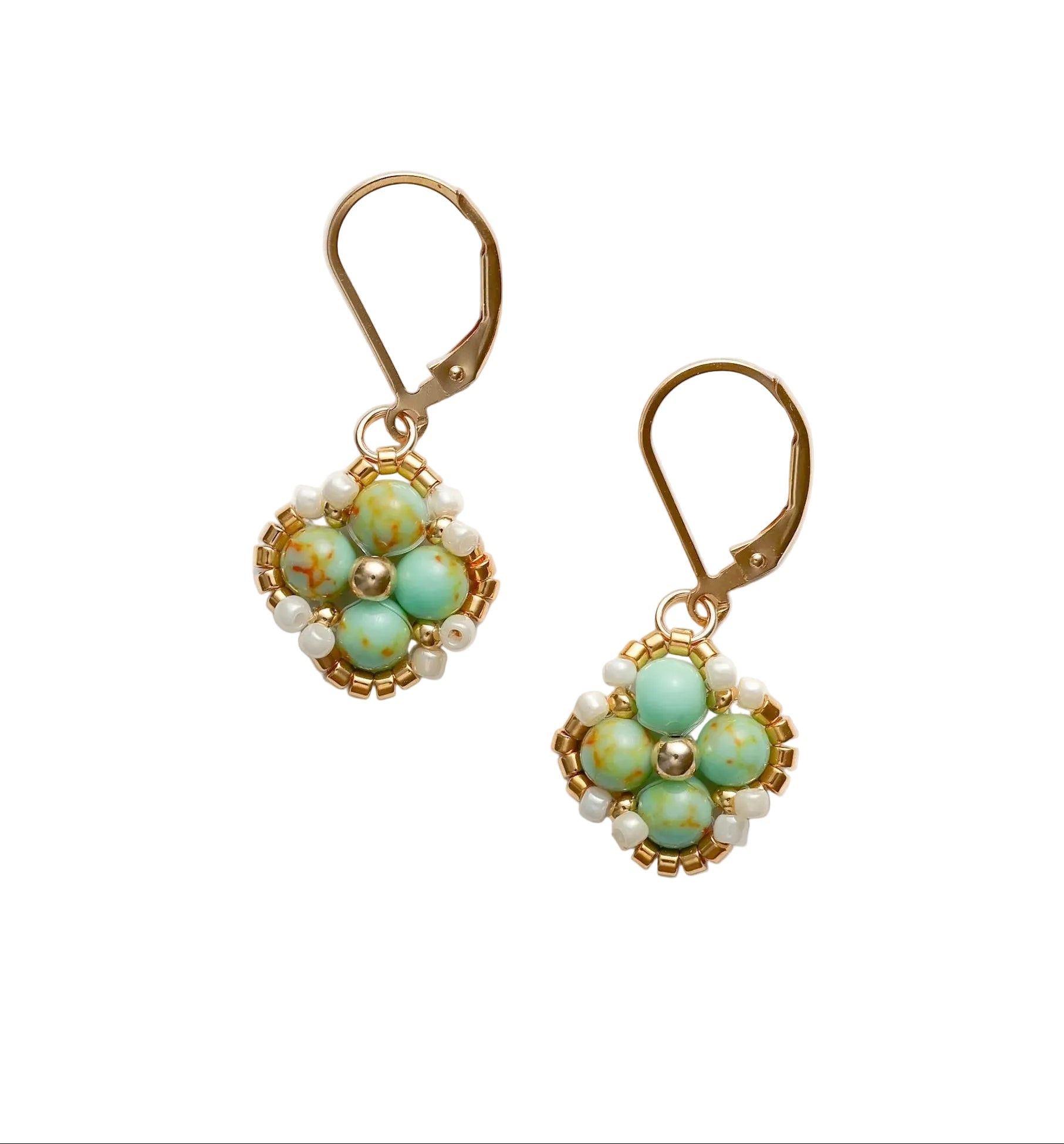 Pair of handmade, beaded earrings with green gemstones and gold accents on a white background